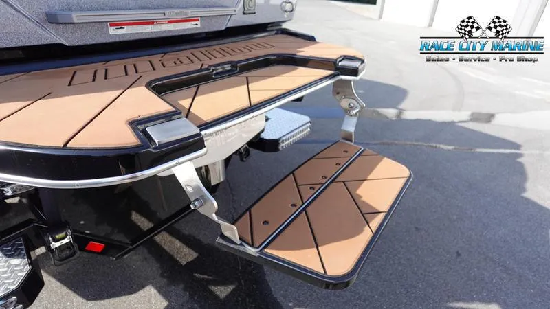 Slide: The Image of 2023 Malibu 26 LSV swim platform with foldable step at Race City Marine. - 8