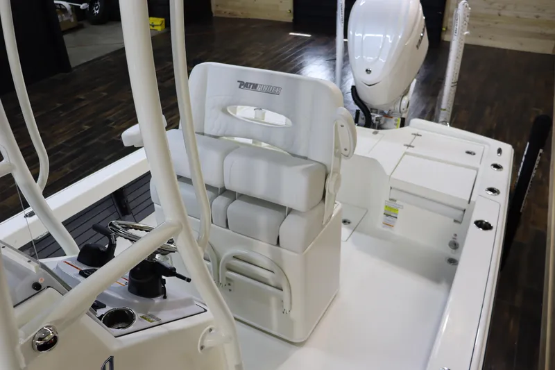 Slide: The Image of 2025 Pathfinder 2500 Hybrid boat interior with seating and controls. - 10