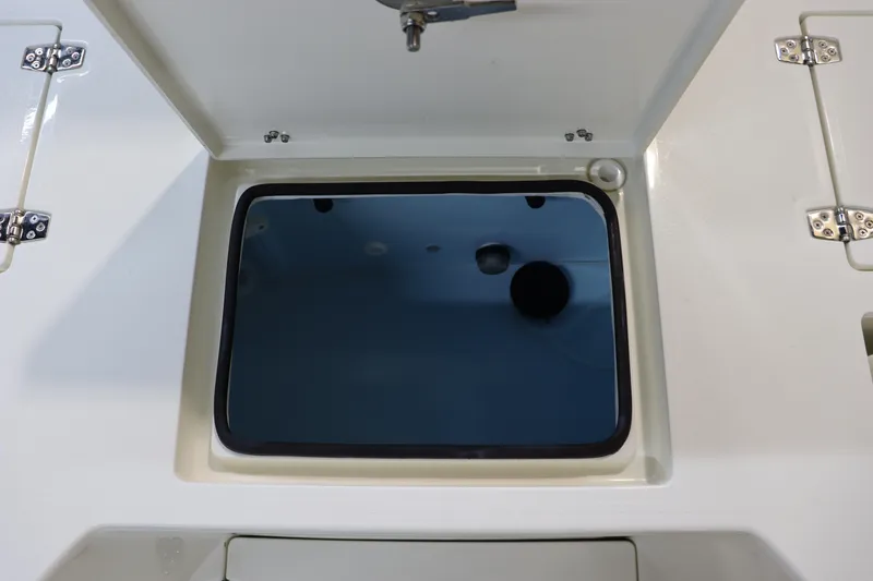 Slide: The Image of Open storage compartment on 2025 Pathfinder 2500 Hybrid boat. - 15