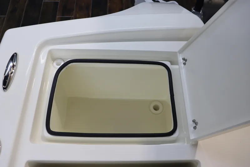 Slide: The Image of Open storage compartment on 2025 Pathfinder 2500 Hybrid boat. - 16
