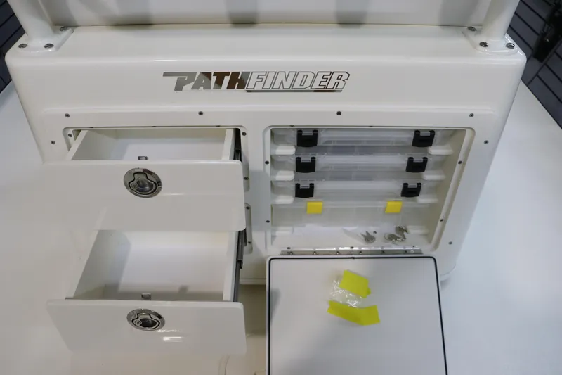 Slide: The Image of Pathfinder 2500 Hybrid 2025 storage compartments with drawers and tackle boxes. - 19