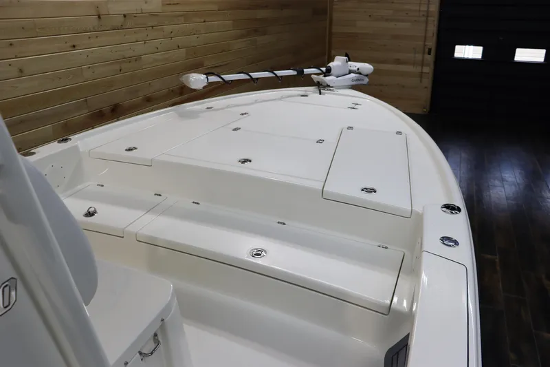 Slide: The Image of 2025 Pathfinder 2500 Hybrid boat interior with sleek white deck design. - 26