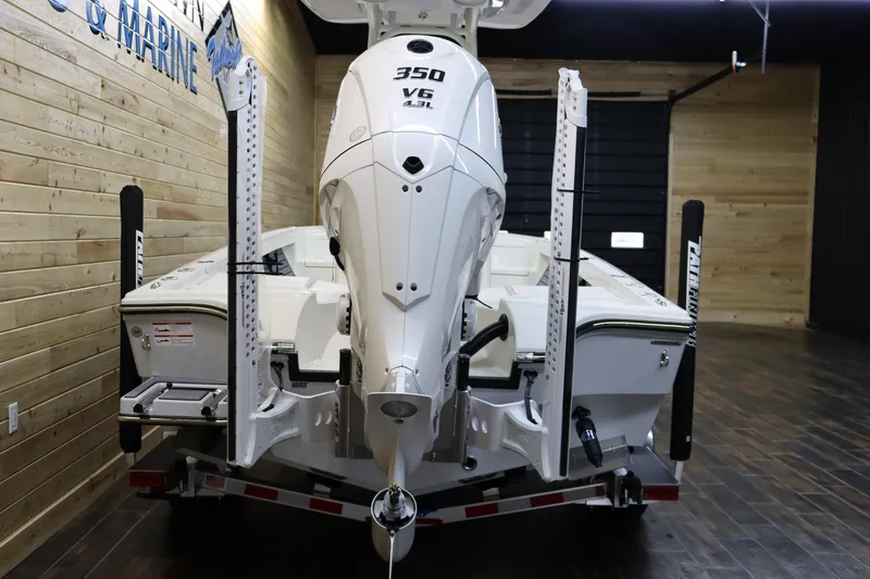 Slide: The Image of 2025 Pathfinder 2500 Hybrid boat with 350 V6 engine in showroom. - 3
