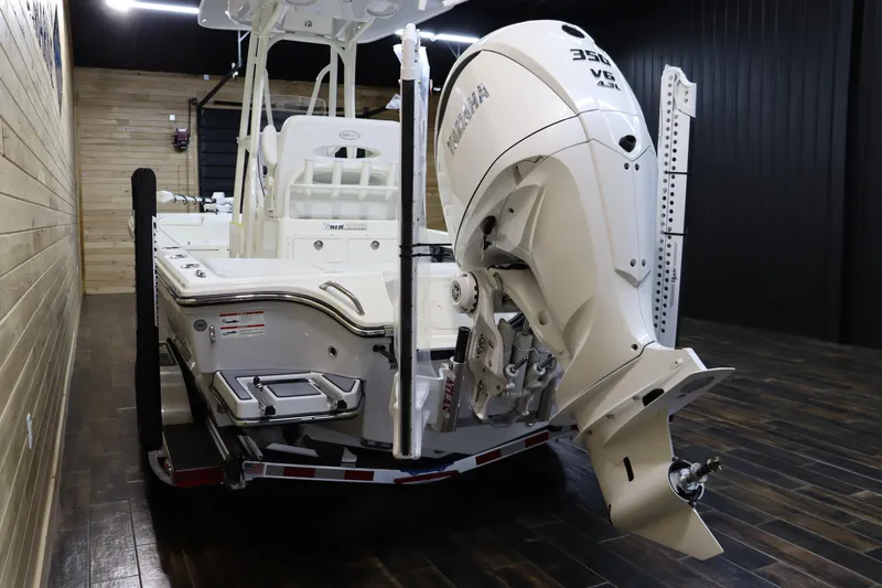 Slide: The Image of 2025 Pathfinder 2500 Hybrid boat with Yamaha 350 V8 engine in showroom. - 4