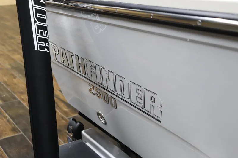 Slide: The Image of 2025 Pathfinder 2500 Hybrid boat logo on metallic surface. - 7
