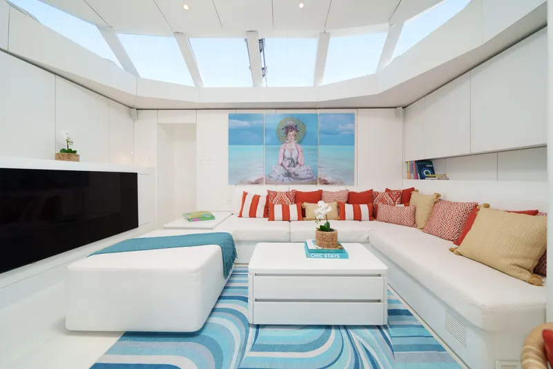 Slide: The Image of Luxurious Sunreef 70 yacht interior, featuring modern white and blue decor, 2016 model. - 12