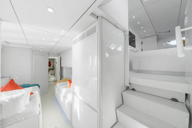 Slide: The Image of Luxurious interior of 2016 Sunreef 70 yacht with modern white design and colorful accents. - 20