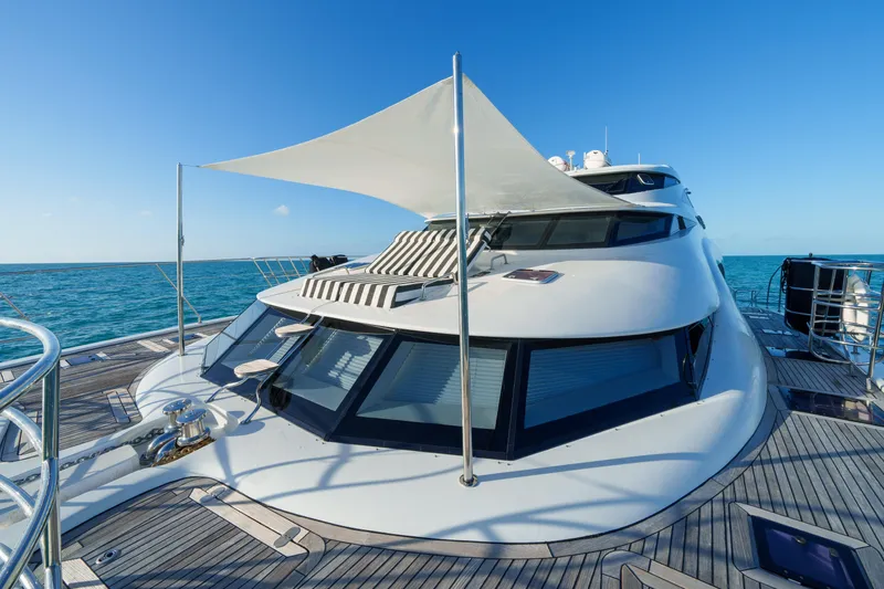 Slide: The Image of Luxurious 2016 Sunreef 70 yacht with sleek design and sunshade on deck. - 31