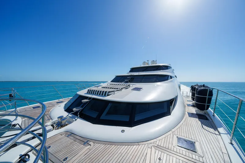 Slide: The Image of Luxurious 2016 Sunreef 70 yacht on clear blue ocean waters. - 32