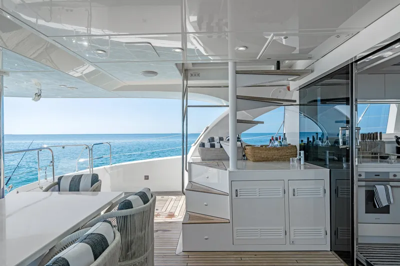 Slide: The Image of Luxurious Sunreef 70 yacht interior with ocean view, featuring modern design and elegant furnishings. - 40