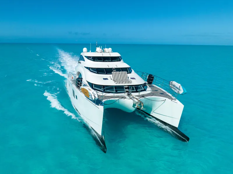 Slide: The Image of Luxurious 2016 Sunreef 70 catamaran cruising in clear turquoise waters. - 46