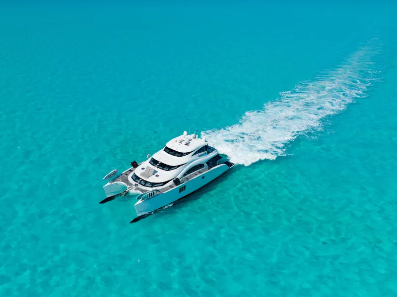 Slide: The Image of Luxury Sunreef 70 yacht cruising in clear turquoise waters, 2016 model. - 49