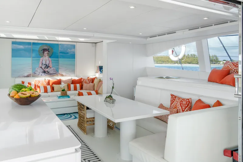 Slide: The Image of Luxurious Sunreef 70 yacht interior with modern white and orange decor, 2016 model. - 8