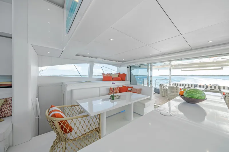 Slide: The Image of Luxurious interior of 2016 Sunreef 70 yacht with modern seating and ocean view. - 9