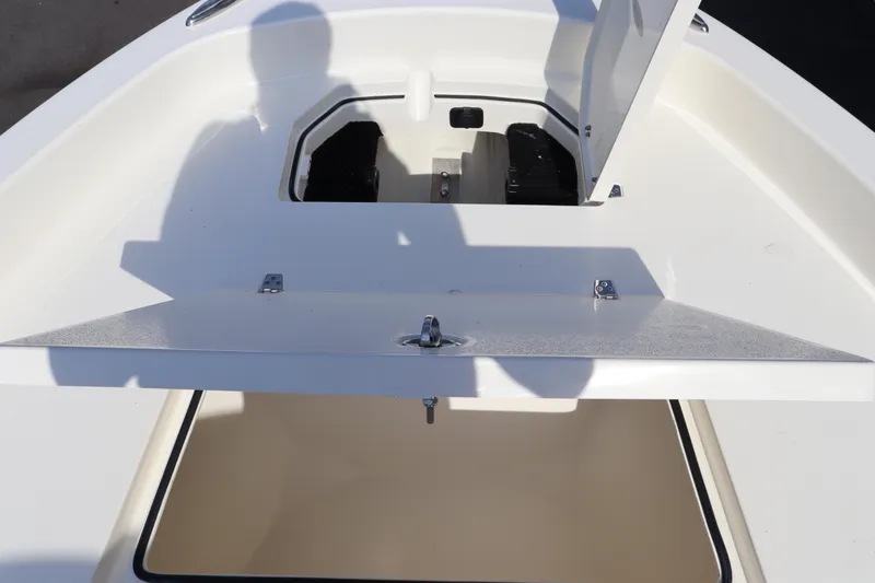 Slide: The Image of 2025 Pathfinder 2700 Open boat storage compartment with open hatch. - 28