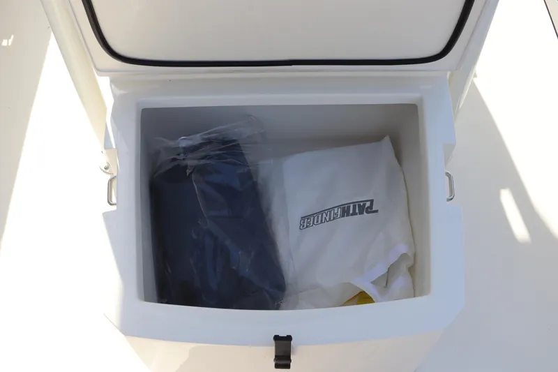 Slide: The Image of Open storage compartment on 2025 Pathfinder 2700 Open boat. - 32
