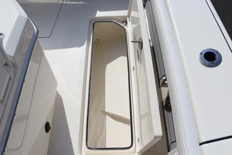 Slide: The Image of 2025 Pathfinder 2700 Open boat storage compartment, open and empty. - 33