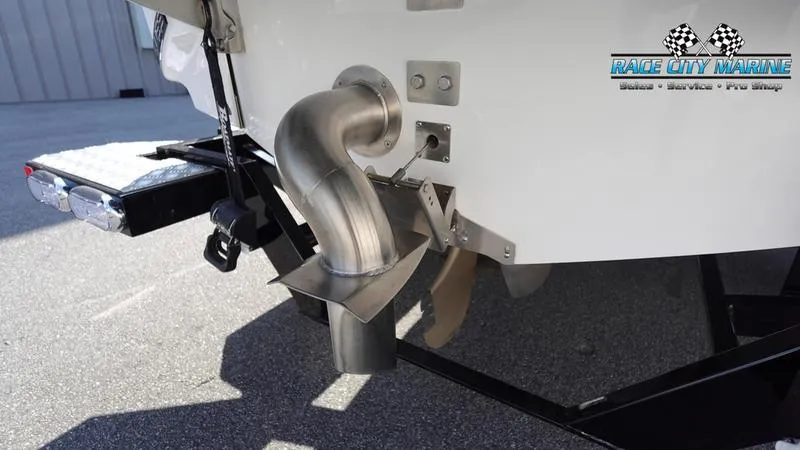 Slide: The Image of 2019 Nautique Super Air Nautique 230 boat exhaust system detail. - 12
