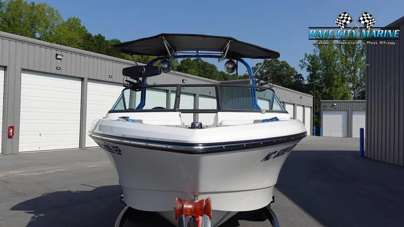 Slide: The Image of 2019 Nautique Super Air Nautique 230 boat at Race City Marine dealership. - 2
