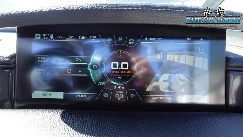 Slide: The Image of Dashboard display of 2019 Nautique Super Air Nautique 230 boat with digital controls. - 24