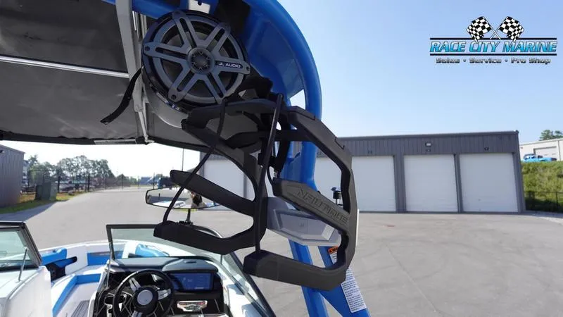 Slide: The Image of 2019 Nautique Super Air Nautique 230 interior with wakeboard rack and speaker. - 35