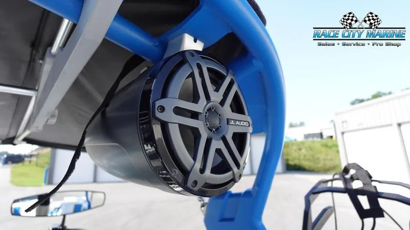 Slide: The Image of JL Audio speaker on 2019 Nautique Super Air Nautique 230 boat, Race City Marine logo visible. - 36