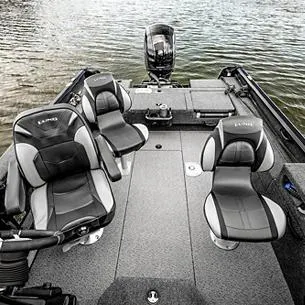 Slide: The Image of 2025 Lund Impact XS 1875 Sport boat interior with sleek seating on water. - 8