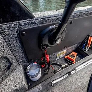 Slide: The Image of 2025 Lund Impact XS 1875 Sport boat interior with control panel and tools. - 9