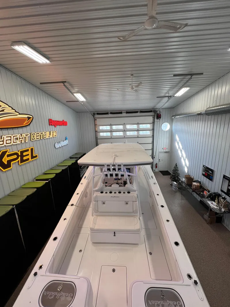 Slide: The Image of 2024 SeaHunter 35 Tournament boat in a garage, top view. - 22