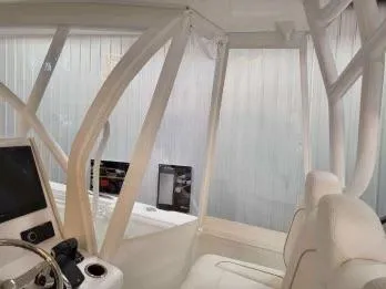 Slide: The Image of Interior of 2024 SeaHunter 35 Tournament boat with modern controls and seating. - 26