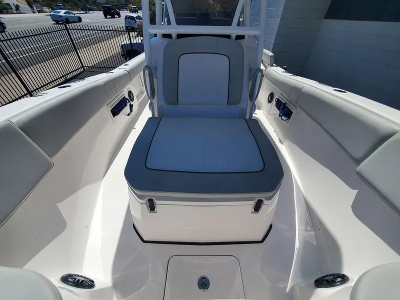 Slide: The Image of 2022 Sea Fox 268 Commander boat interior with cushioned seating and storage. - 13