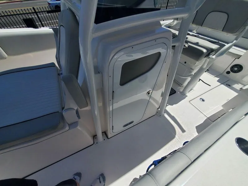 Slide: The Image of 2022 Sea Fox 268 Commander interior with seating and storage compartment. - 15