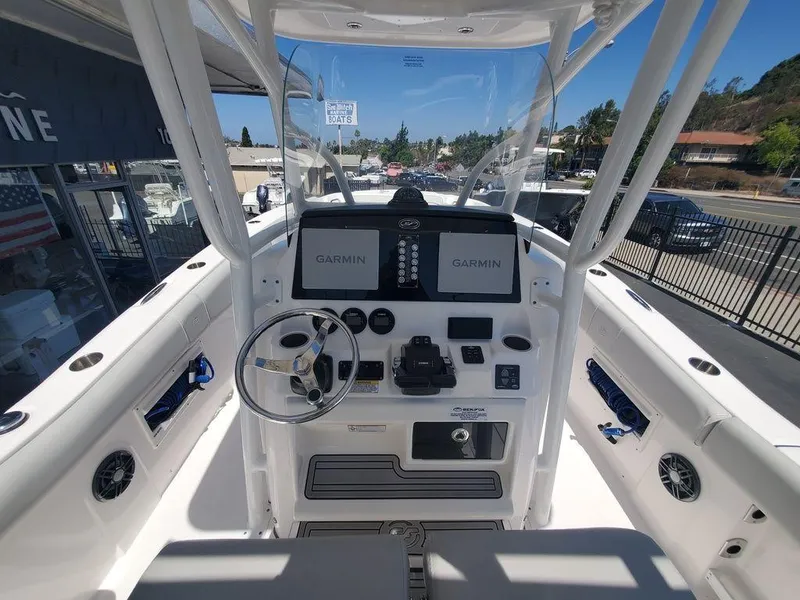 Slide: The Image of 2022 Sea Fox 268 Commander boat cockpit with Garmin navigation displays. - 17