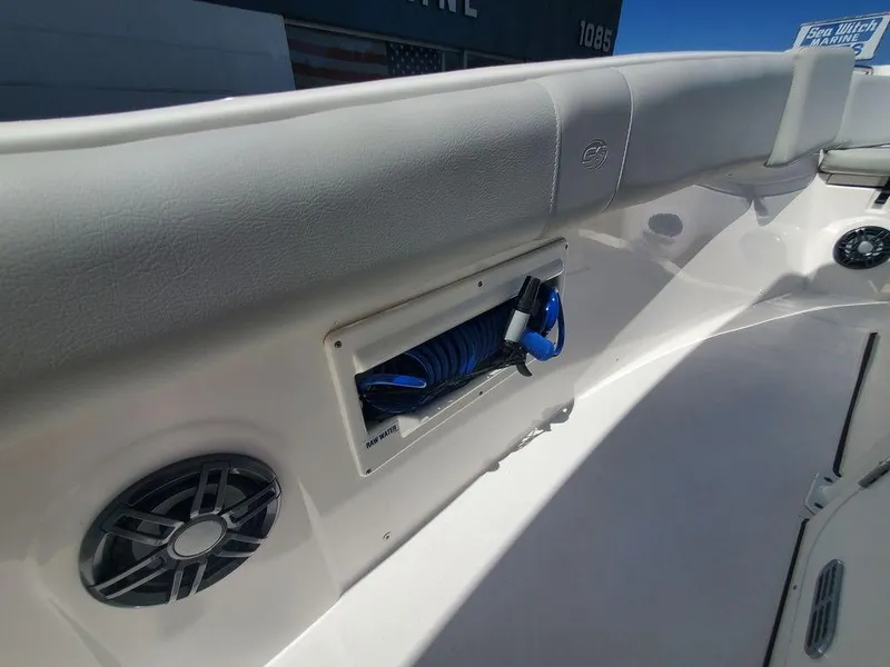 Slide: The Image of 2022 Sea Fox 268 Commander boat interior with hose storage and speaker. - 21