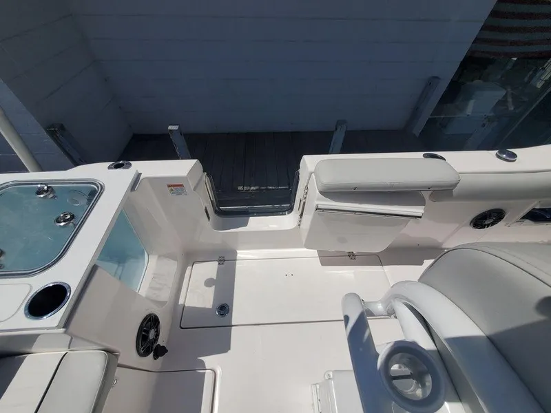 Slide: The Image of 2022 Sea Fox 268 Commander boat interior with seating and storage compartments. - 27