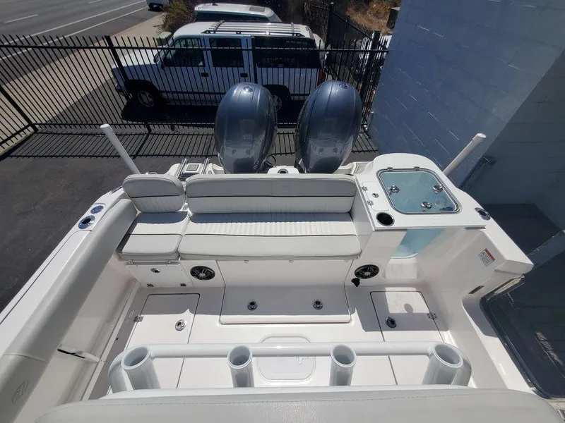 Slide: The Image of 2022 Sea Fox 268 Commander boat interior with dual engines and seating area. - 29