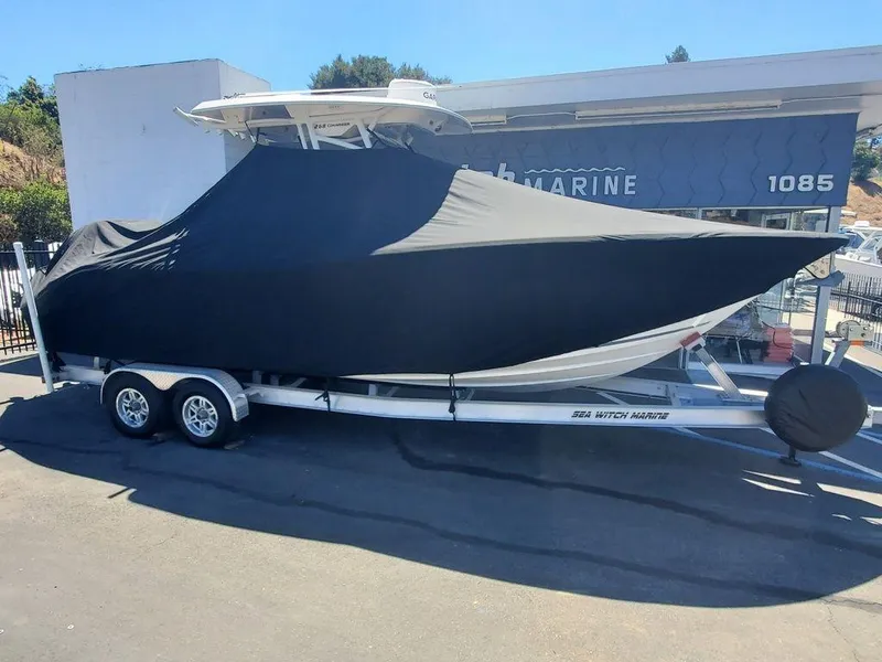 Slide: The Image of 2022 Sea Fox 268 Commander boat covered on trailer outside dealership. - 35