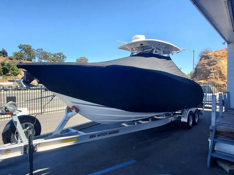 Slide: The Image of 2022 Sea Fox 268 Commander boat on trailer, covered, outdoors. - 36
