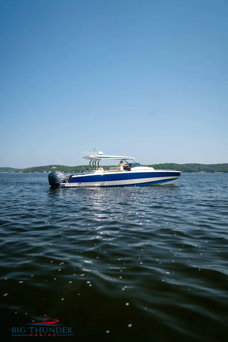 Slide: The Image of 2024 Opus 12 boat on a sunny lake - 21