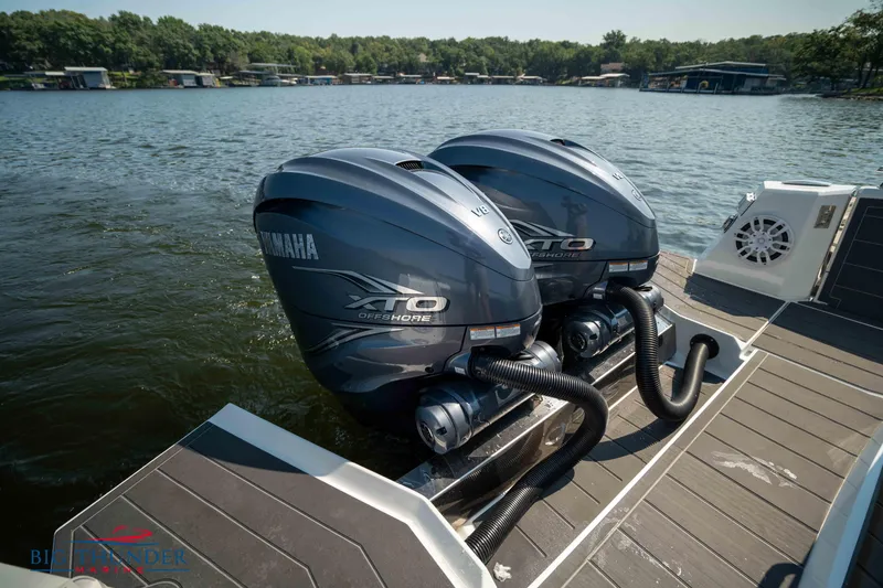 Slide: The Image of Two Yamaha XTO outboard motors on a boat in the water. - 39