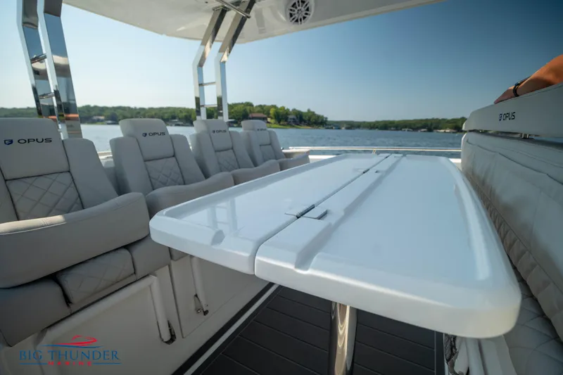 Slide: The Image of Luxurious interior of Opus 12 boat, 2024 model, featuring stylish seating. - 42