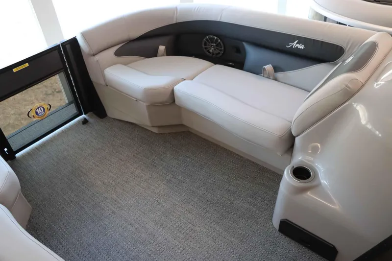Slide: The Image of 2025 Barletta ARIA 22QC boat interior with plush seating and modern design. - 11