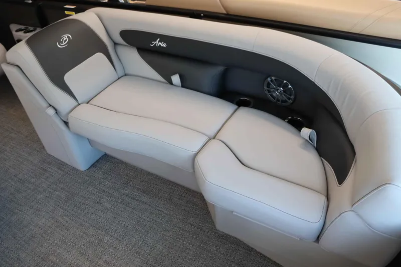 Slide: The Image of 2025 Barletta ARIA 22QC boat seating with gray upholstery and integrated speaker. - 12