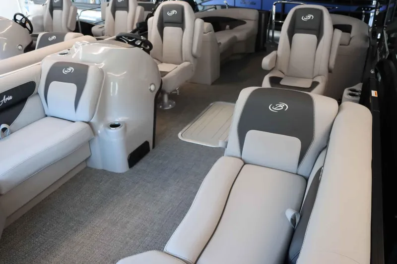 Slide: The Image of 2025 Barletta ARIA 22QC interior with luxurious seating and modern design. - 14