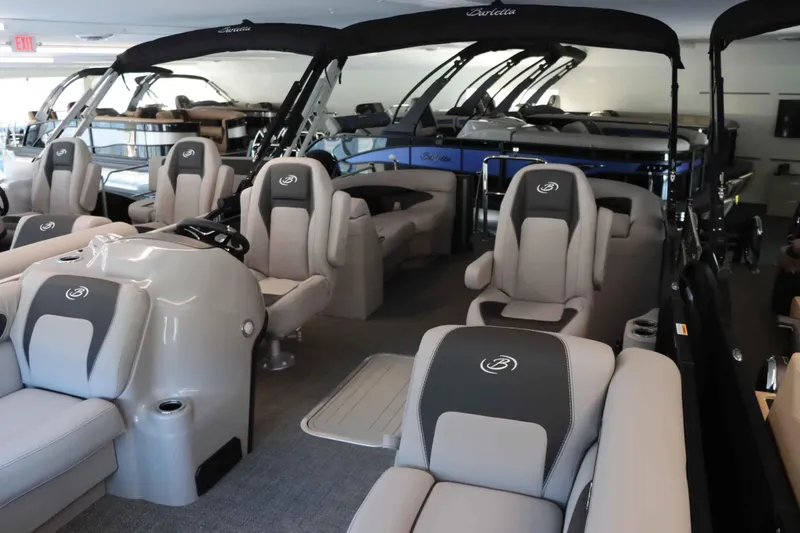 Slide: The Image of 2025 Barletta ARIA 22QC pontoon boat interior with luxurious seating and modern design. - 15