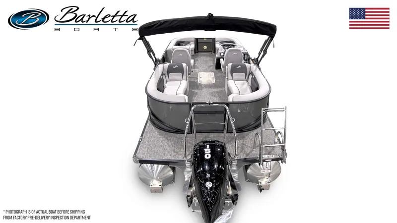 Slide: The Image of 2025 Barletta ARIA 22QC pontoon boat with outboard motor and seating, USA flag. - 21