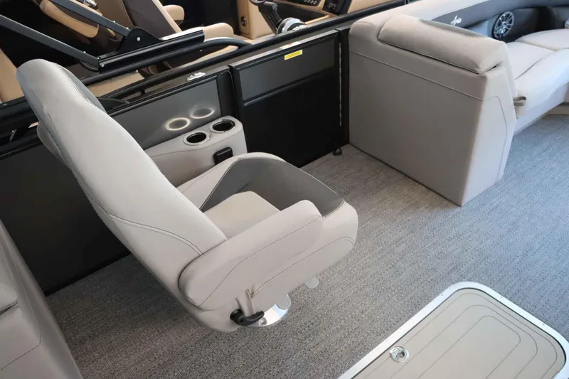 Slide: The Image of 2025 Barletta ARIA 22QC boat interior with plush seating and modern design. - 7