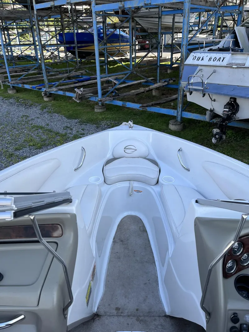 Slide: The Image of 2005 Crownline 180 BR boat interior, docked in storage facility. - 12