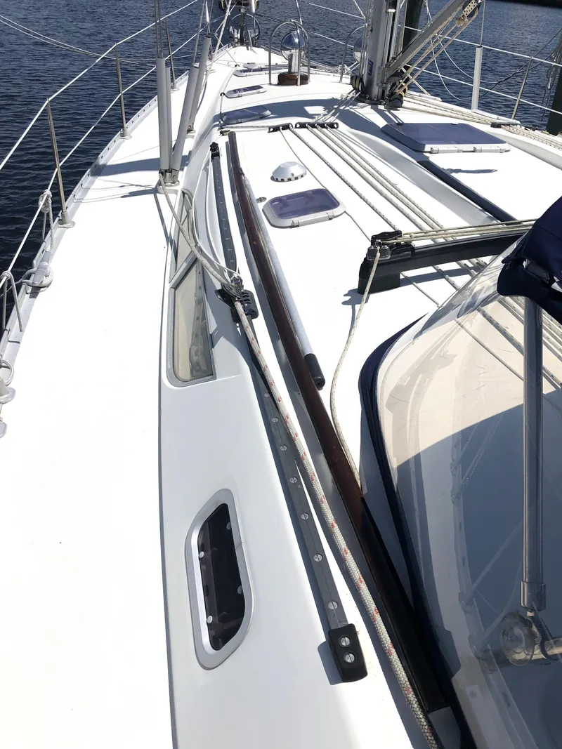 Slide: The Image of 2001 Jeanneau 45.2 sailboat deck with rigging and hatch details. - 3