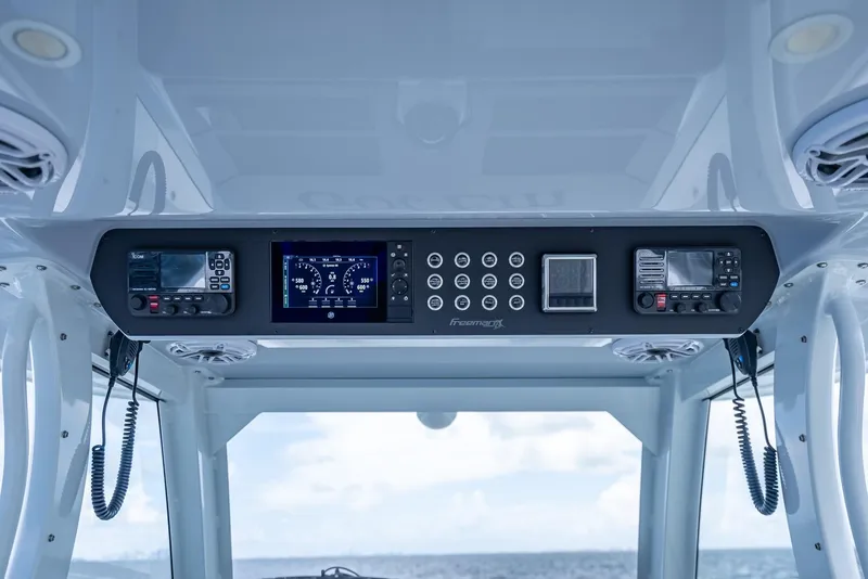 Slide: The Image of Freeman 43 boat dashboard with modern navigation and communication equipment, 2023 model. - 28
